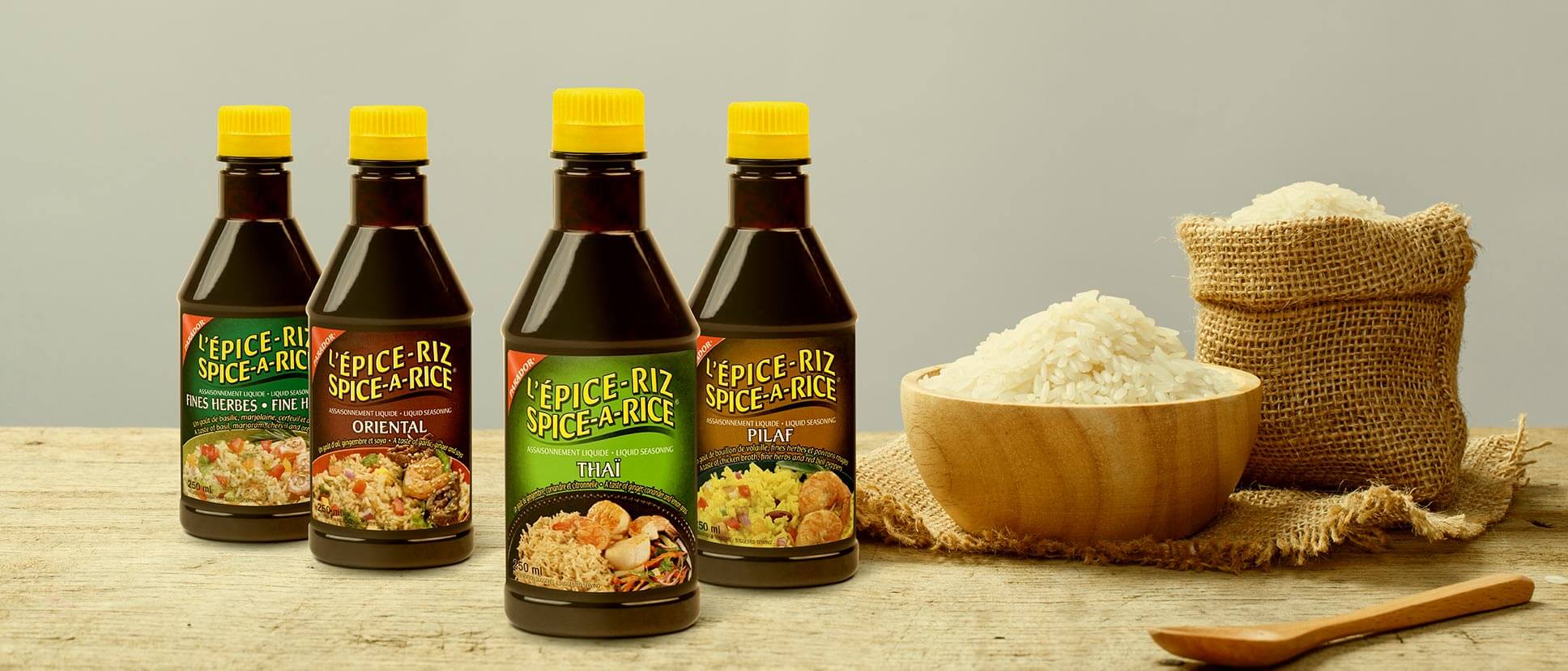 Several rice spices on a table.